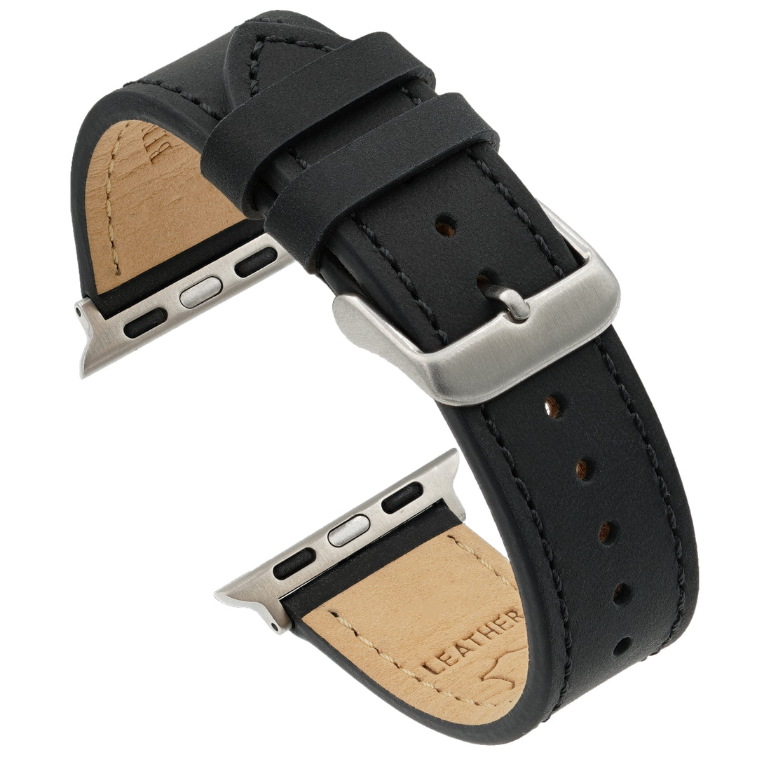 Black leather watch band with buckle and stainless steel hardware, showing the underside of the strap and the brand 'Leather' etched on the leather. #color_black