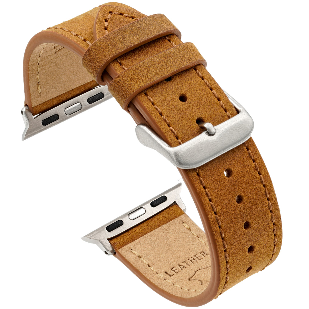 Brown leather watch strap with silver hardware on a white background #color_sand