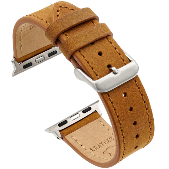 Brown leather watch strap with silver hardware on a white background #color_sand