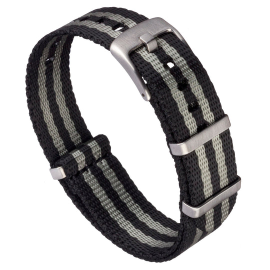 Black and gray striped watch strap with silver buckle on a white background #color_black-and-grey-regimental-striped