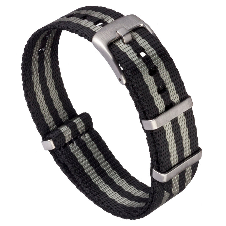 Black and gray striped watch strap with silver buckle on a white background #color_black-and-grey-regimental-striped