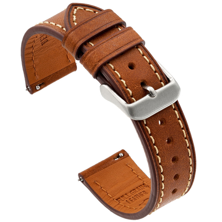Brown leather watch strap with silver buckle on a white background #color_cognac