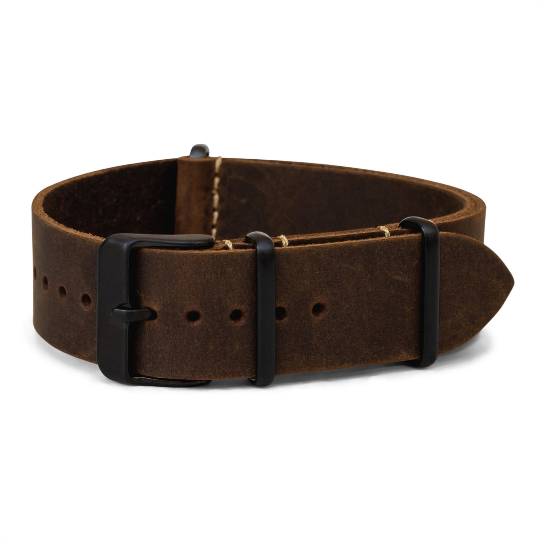 Brown leather watch band with black buckle on a white background #color_dark-brown-pvd