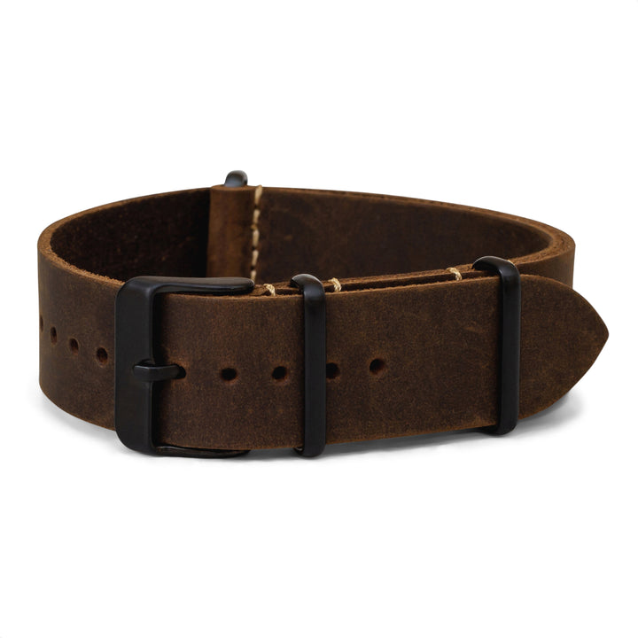 Brown leather watch band with black buckle on a white background #color_dark-brown-pvd