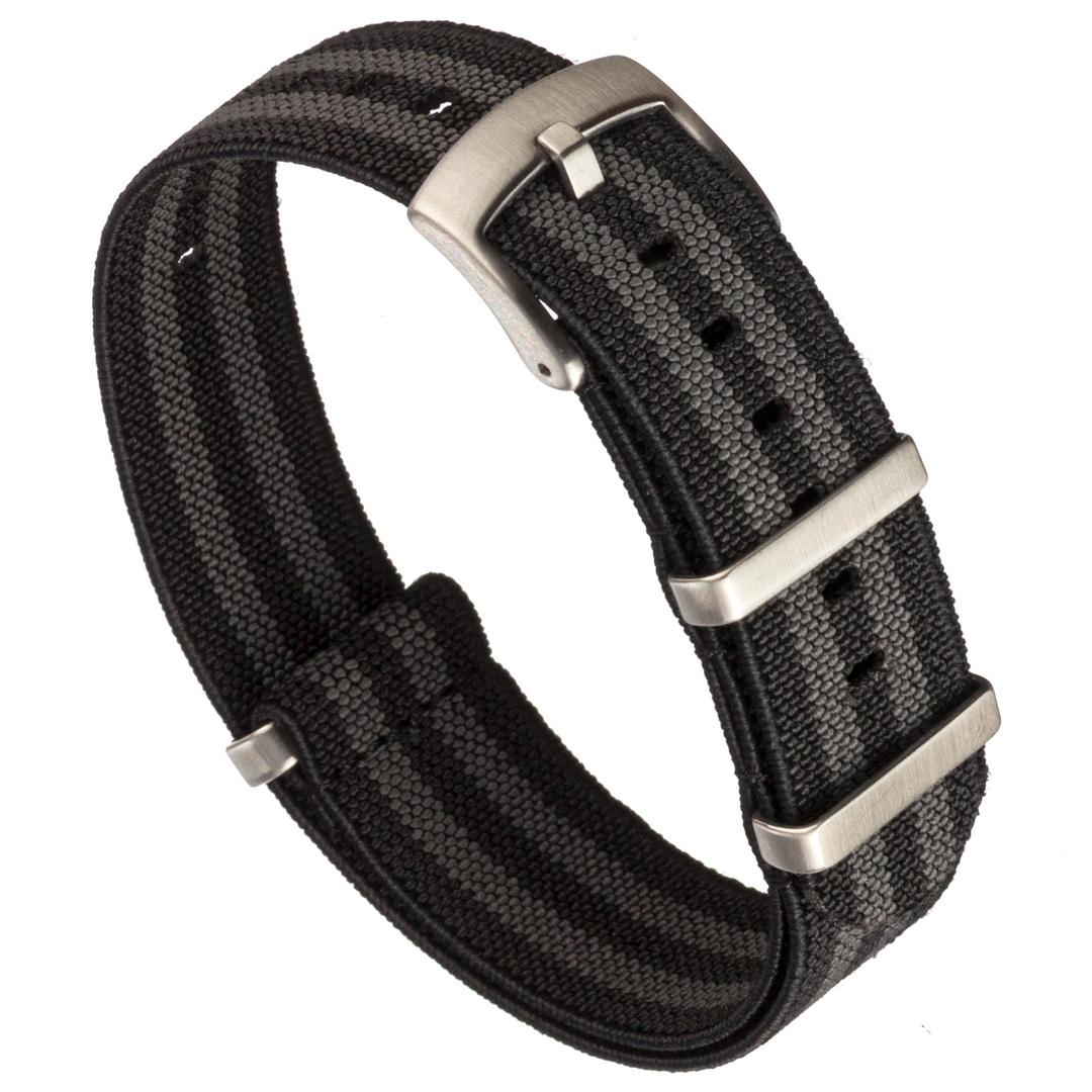 A black and grey striped elastic slip-through watch strap with stainless steel hardware. #color_black-and-grey-striped