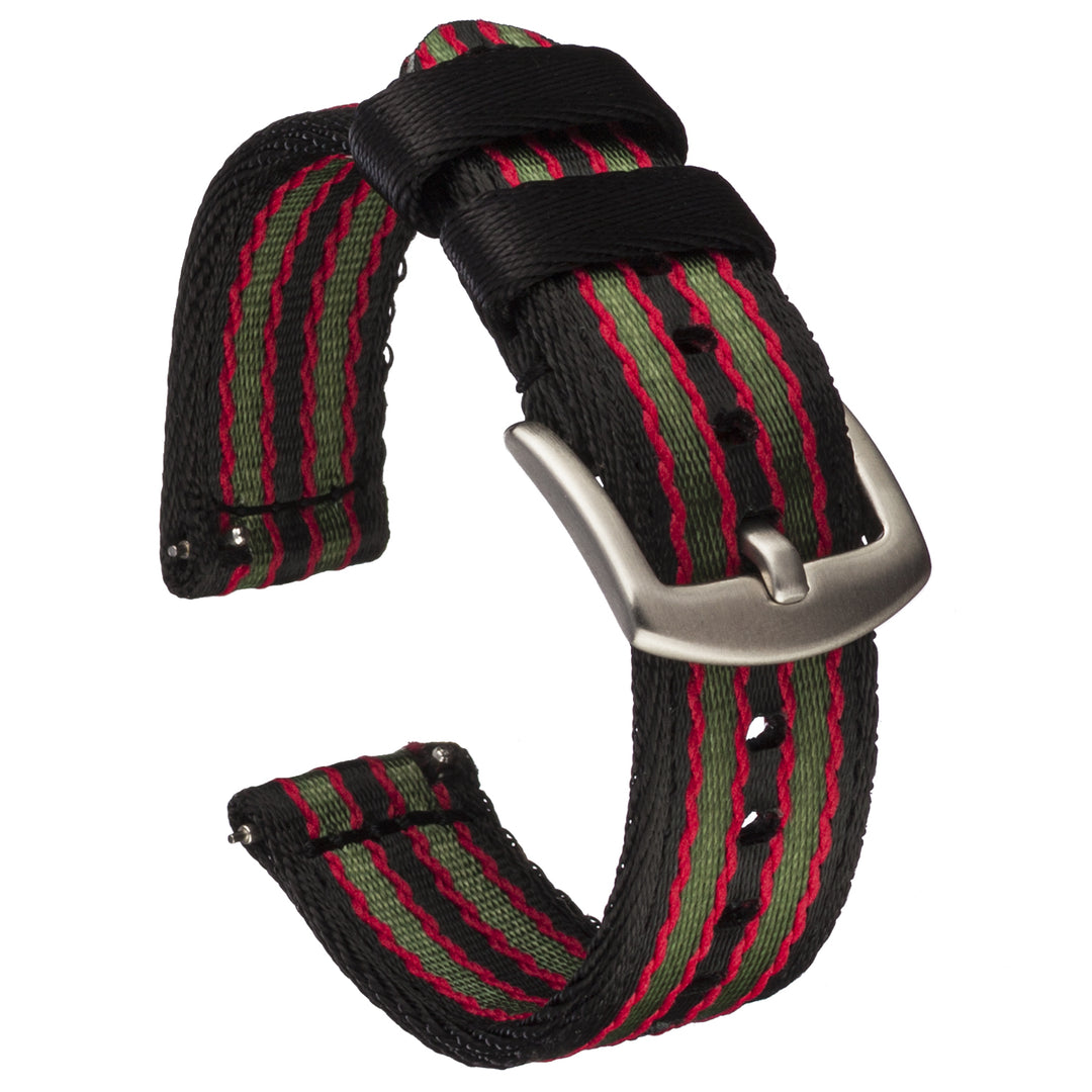 A striped nylon quick release seat belt watch band with a silver buckle, featuring black, red, and green colors. #color_black-red-and-green-striped
