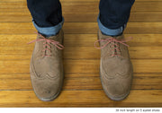 burnt-orange-round-waxed-cotton-shoelaces-on-shoes
